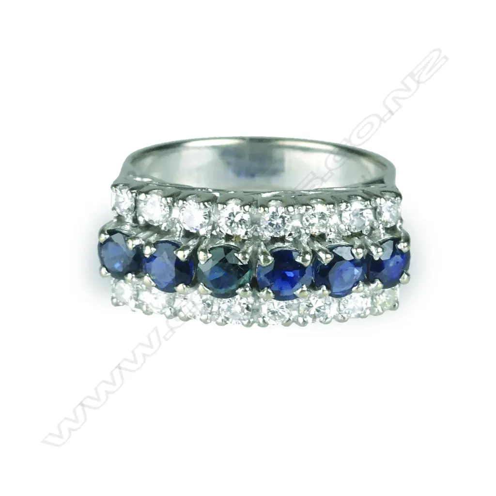 A vintage 14ct. white gold sapphire and diamond ring Image 1++