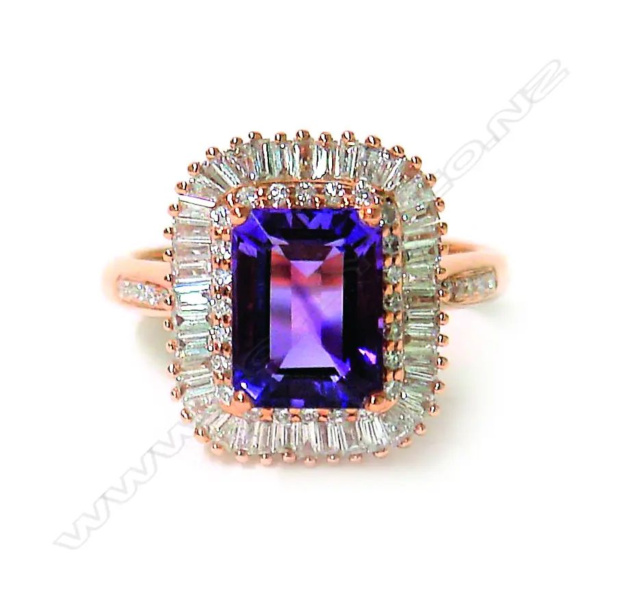 A modern 18ct. rose gold amethyst and diamond dress ring Image 1++