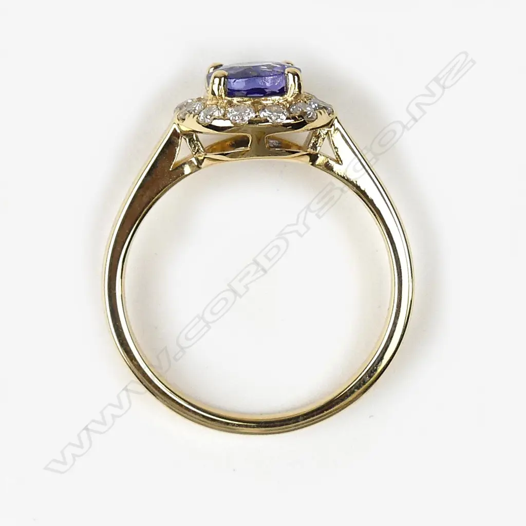 A 14ct gold tanzanite and diamond ring Image 1++