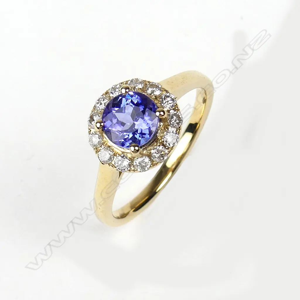 A 14ct gold tanzanite and diamond ring Image 1++