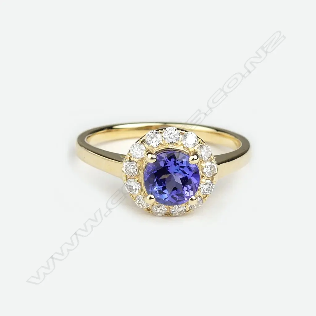 A 14ct gold tanzanite and diamond ring Image 1++