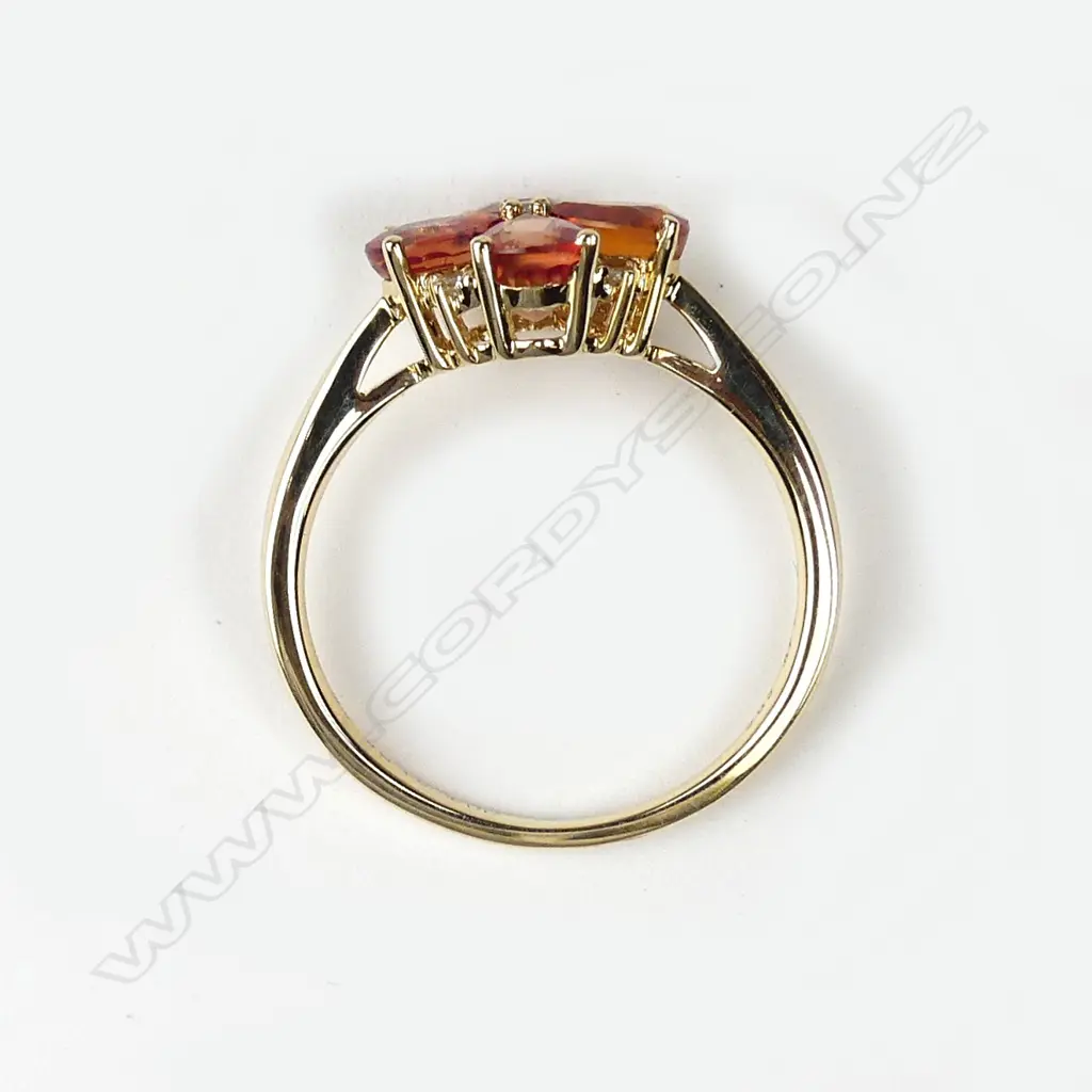 A 14ct gold sapphire and diamond ring Image 1++