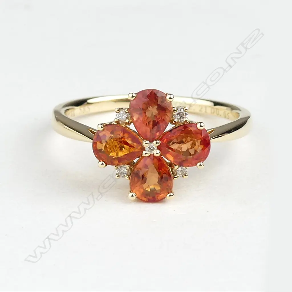 A 14ct gold sapphire and diamond ring Image 1++