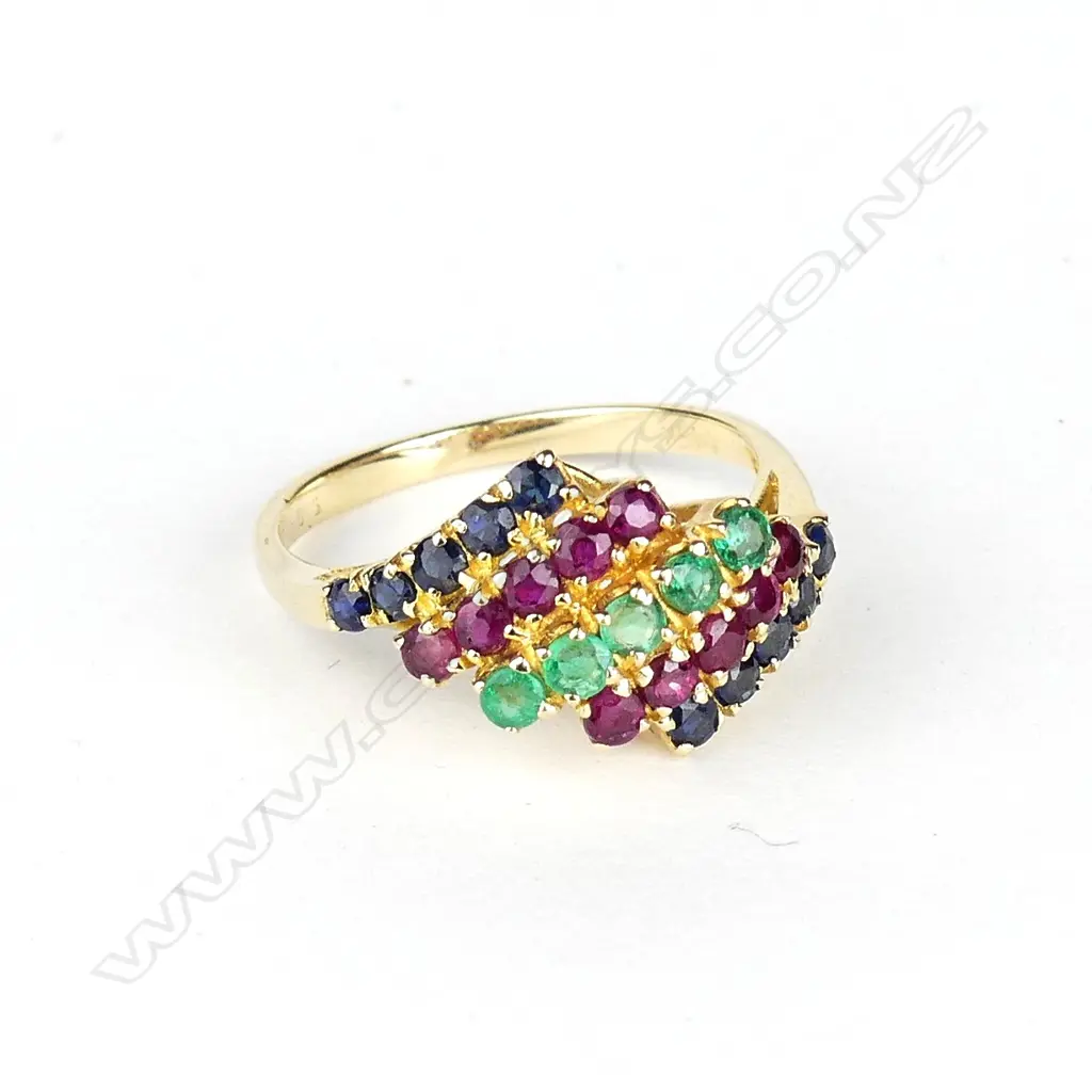 An 18ct gold ruby sapphire and emerald ring Image 1++