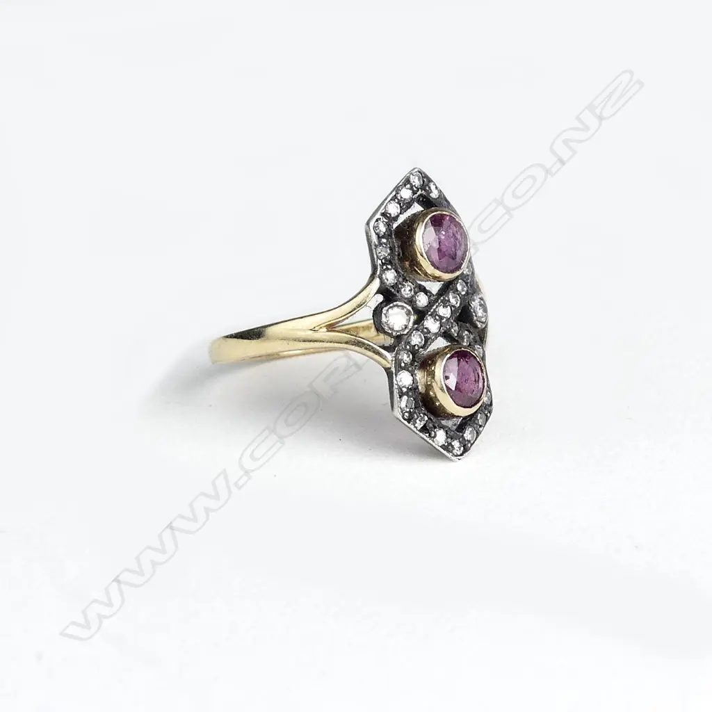 A 15ct gold silver diamond and ruby ring Image 1++