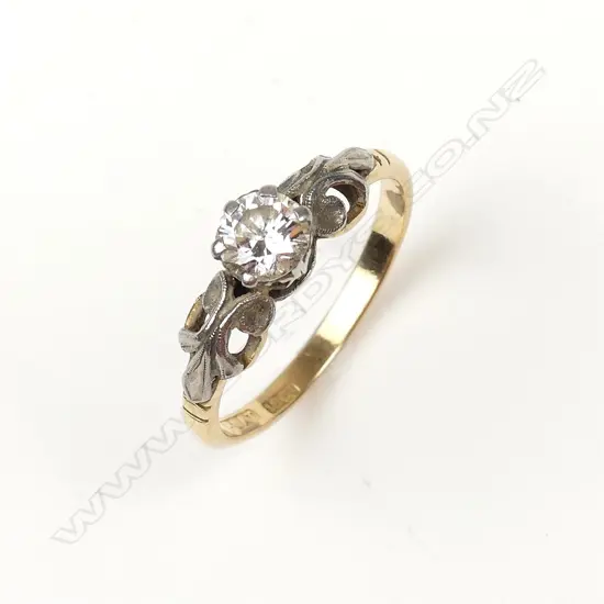 A vintage 18ct. gold solitaire diamond ring