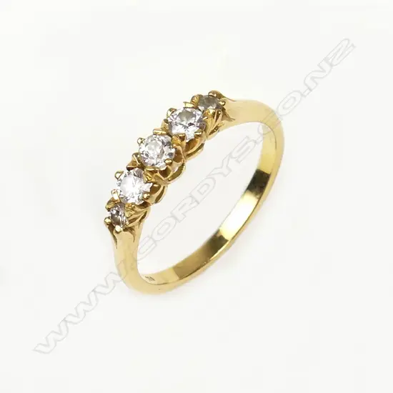 A vintage 18ct. gold five stone diamond ring