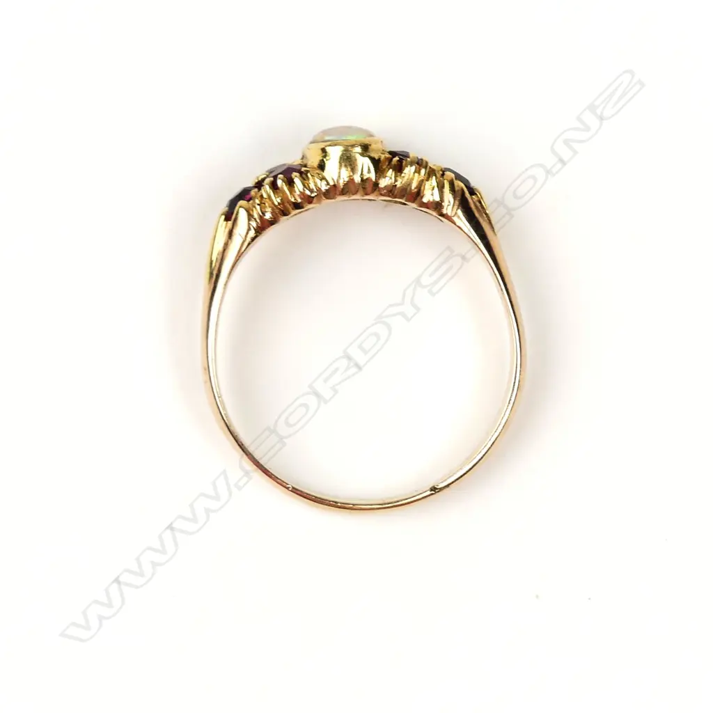 A vintage 9ct. yellow gold opal and ruby ring Image 1++