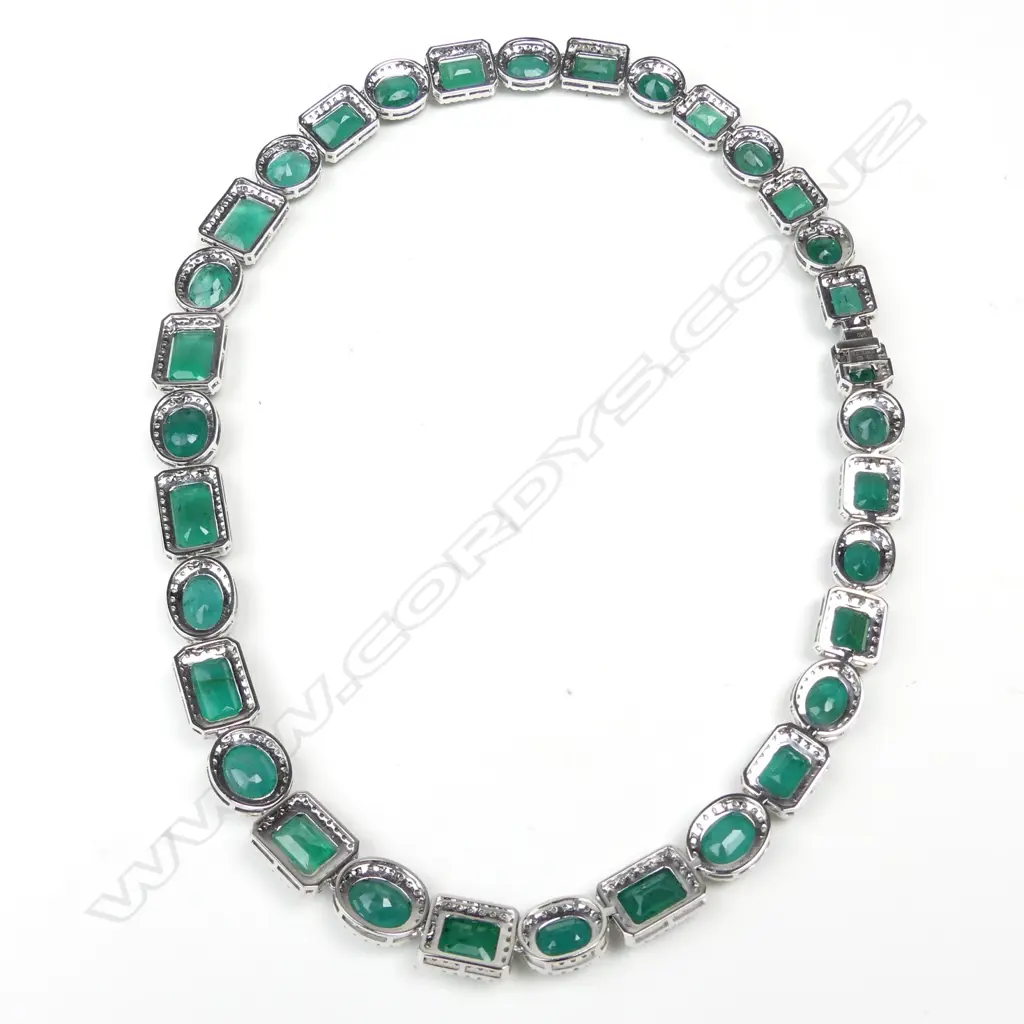 An impressive platinum emerald and diamond necklace Image 1++