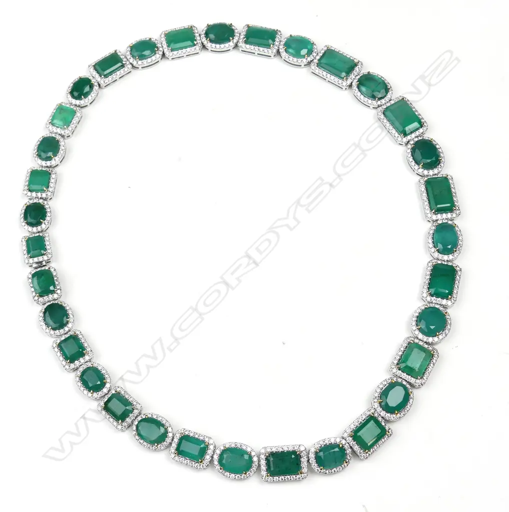 An impressive platinum emerald and diamond necklace Image 1++