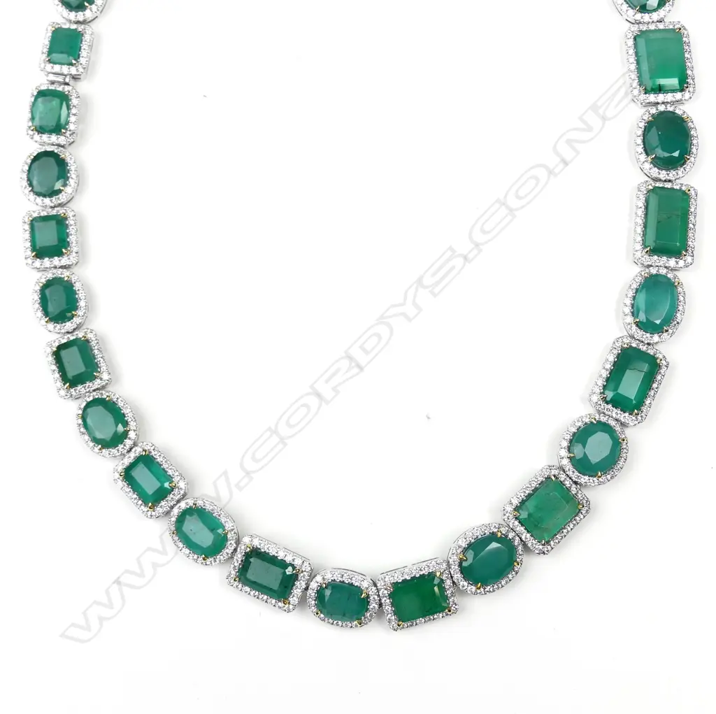 An impressive platinum emerald and diamond necklace Image 1++