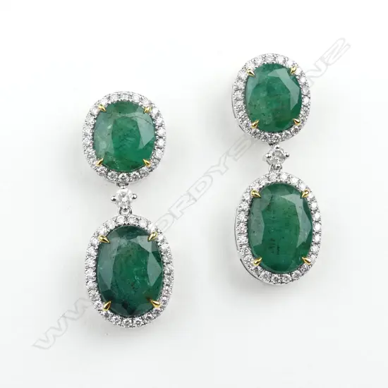 A pair of 14ct white gold emerald and diamond drop earrings