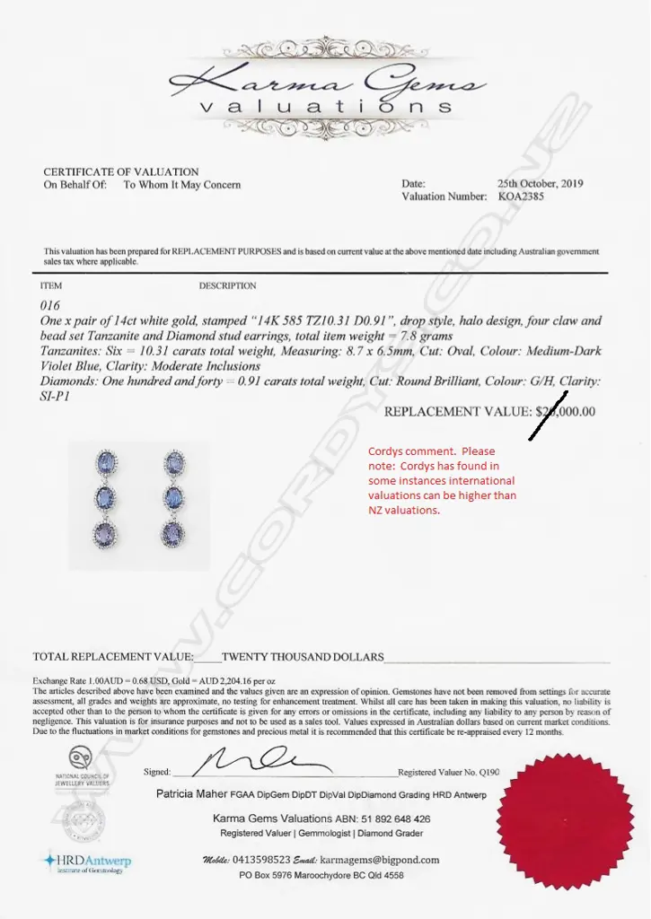 A pair of 14ct white gold tanzanite and diamond drop earrings Image 1++