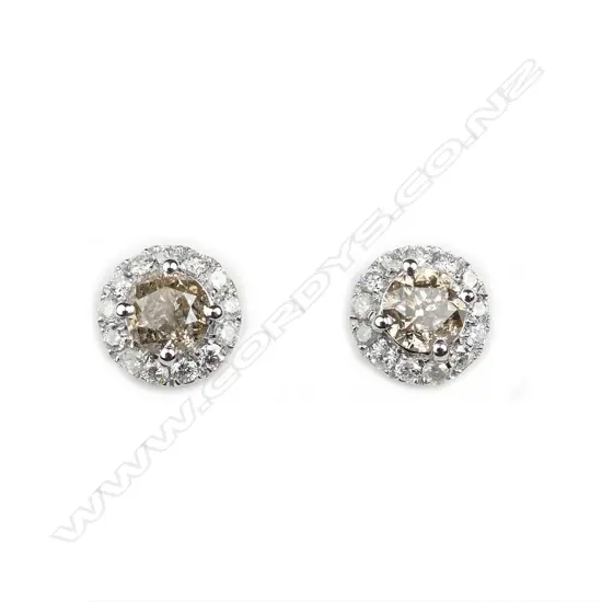 A pair of 14ct white gold and diamond earrings