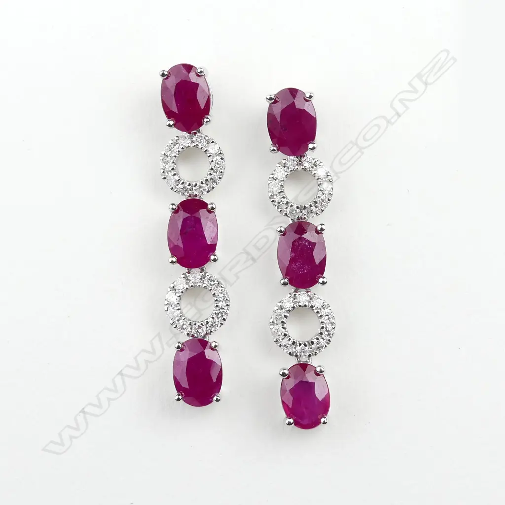 A pair of 14ct white gold ruby and diamond drop earrings Image 1++