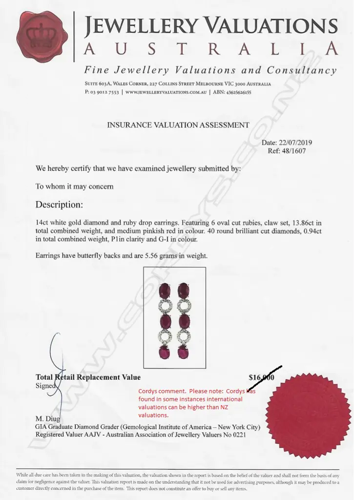 A pair of 14ct white gold ruby and diamond drop earrings Image 1++