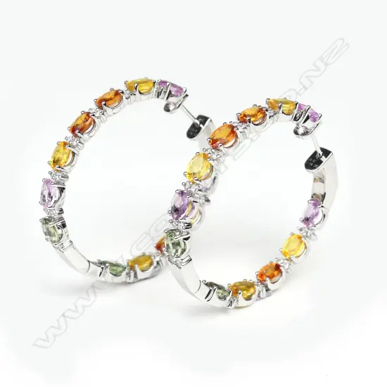 A pair of 14ct white gold sapphire and diamond hoop earrings