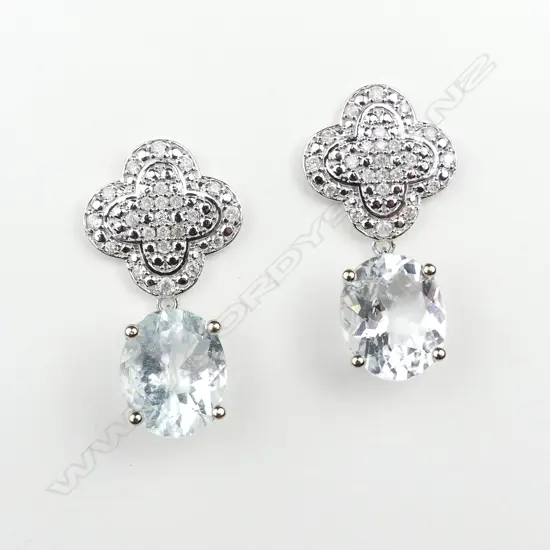 A pair of 14ct white gold aquamarine and diamond earrings