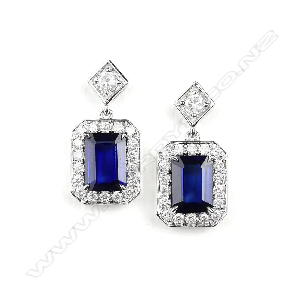 A pair of 14ct white gold sapphire and diamond drop earrings Image 1++