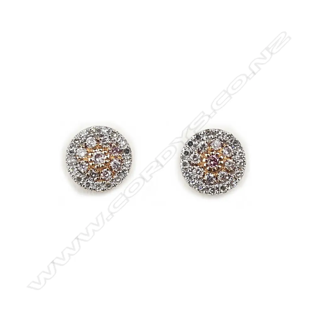 A pair of 18ct rose gold and diamond cluster earrings Image 1++