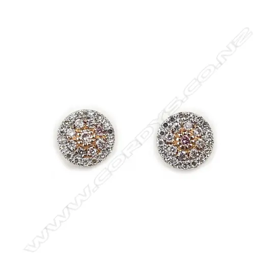 A pair of 18ct rose gold and diamond cluster earrings