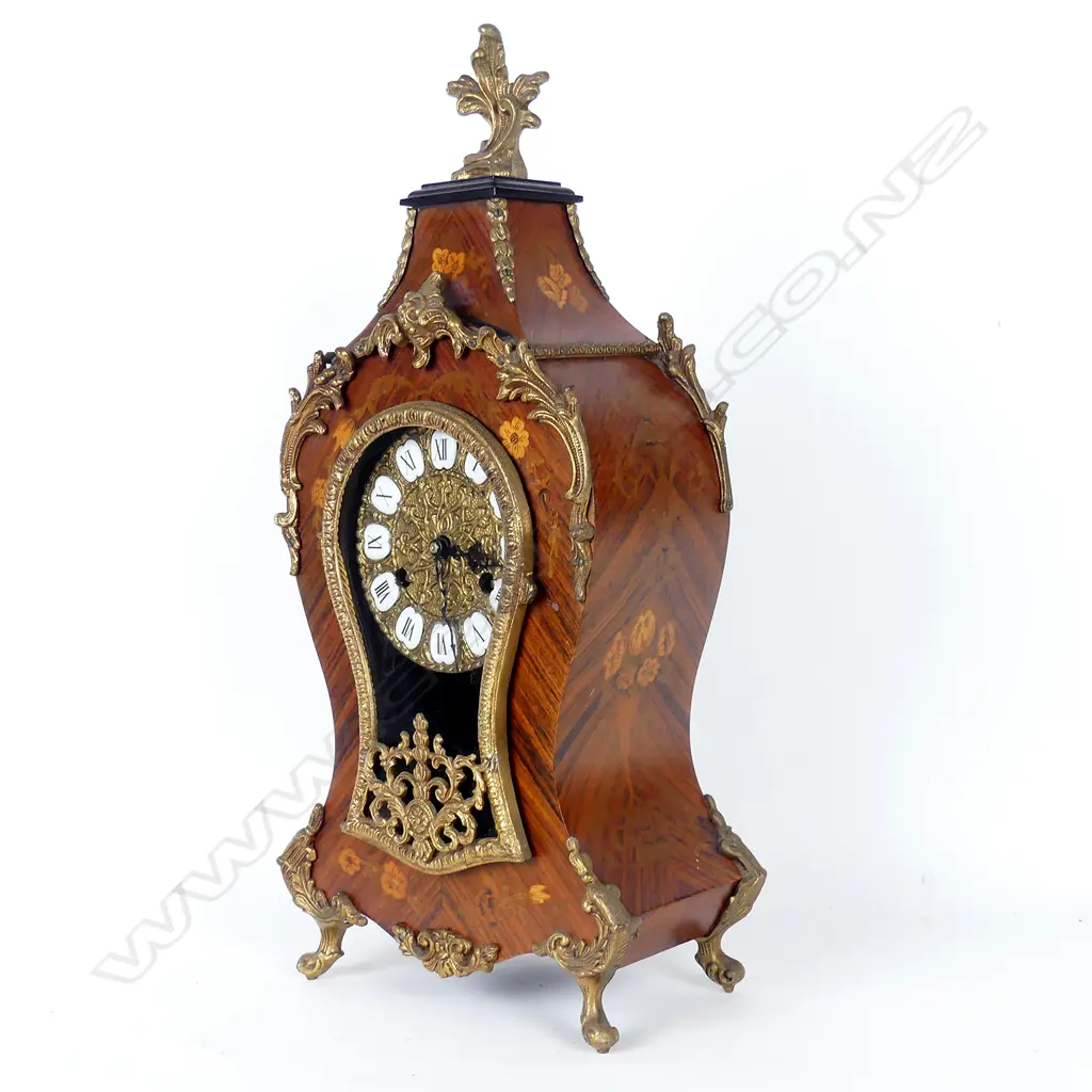 A Continental kingwood mantel clock Image 1++