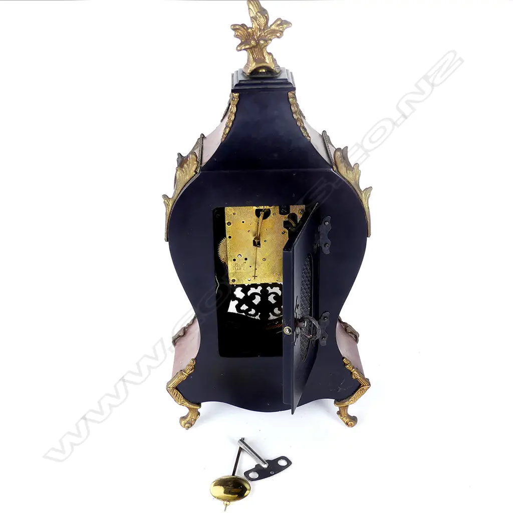 A Continental kingwood mantel clock Image 1++