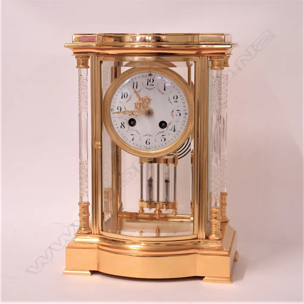 A quality mid-20thC French gilt brass four-glass type mantel clock Image 1++