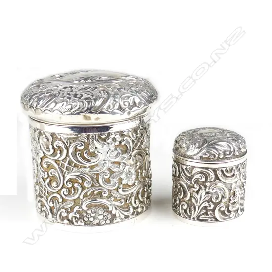 Two c.1900 silver embossed vanity jars