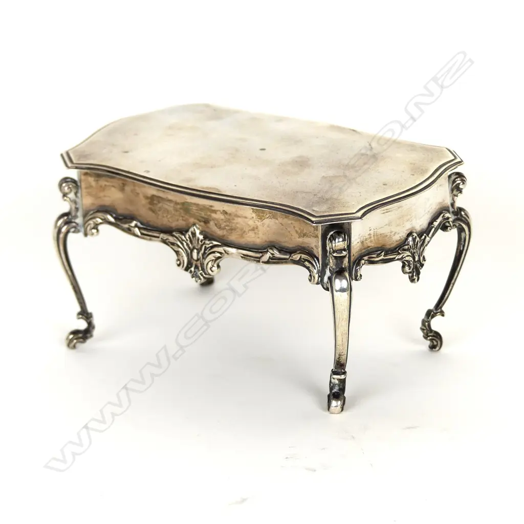 A small silver trinket box in the form of a French table Image 1++