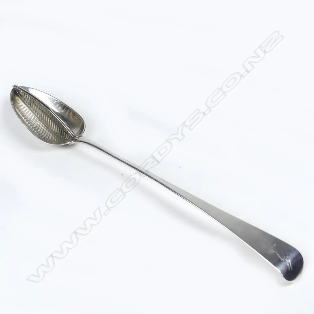 A George III silver fiddle pattern gravy straining spoon Image 1++
