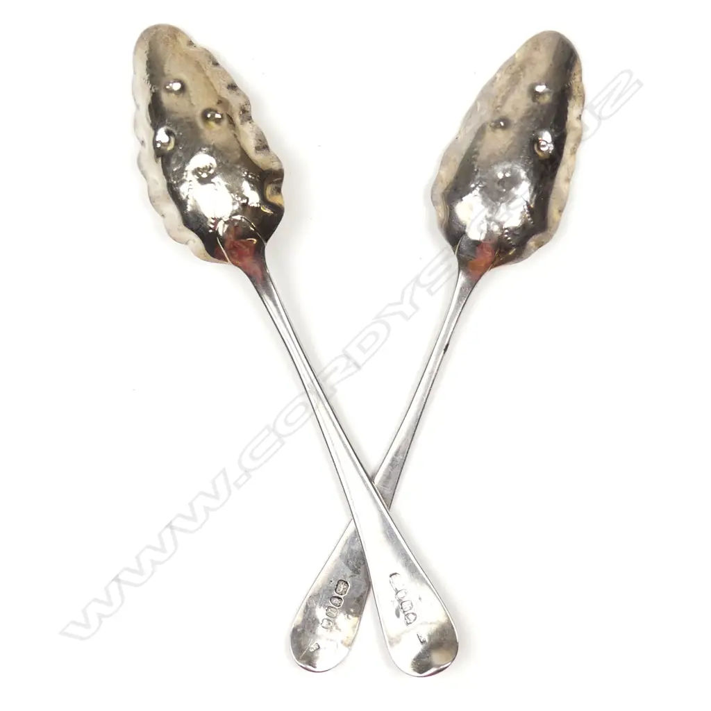 A pair of George III silver berry spoons Image 1++