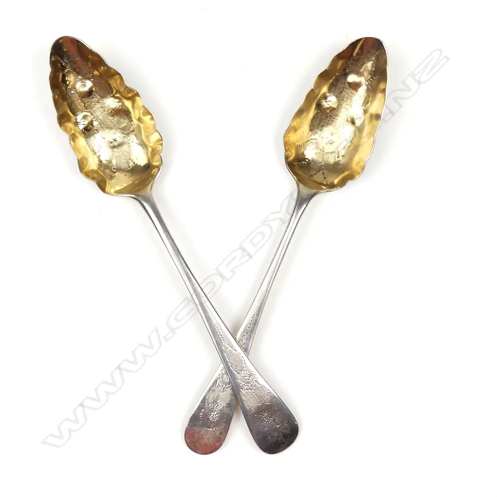 A pair of George III silver berry spoons Image 1++