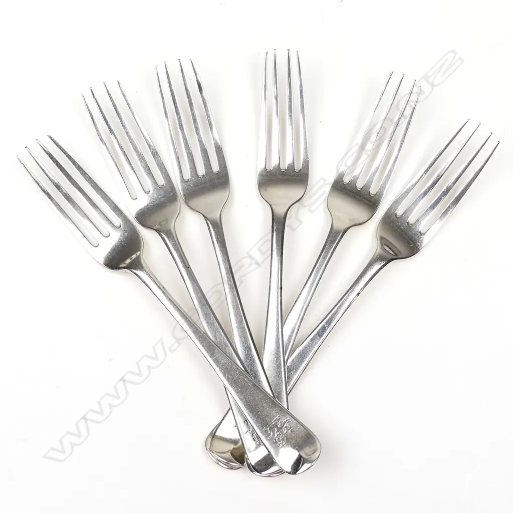 A set of six George III silver Hanoverian pattern table forks Image 1++