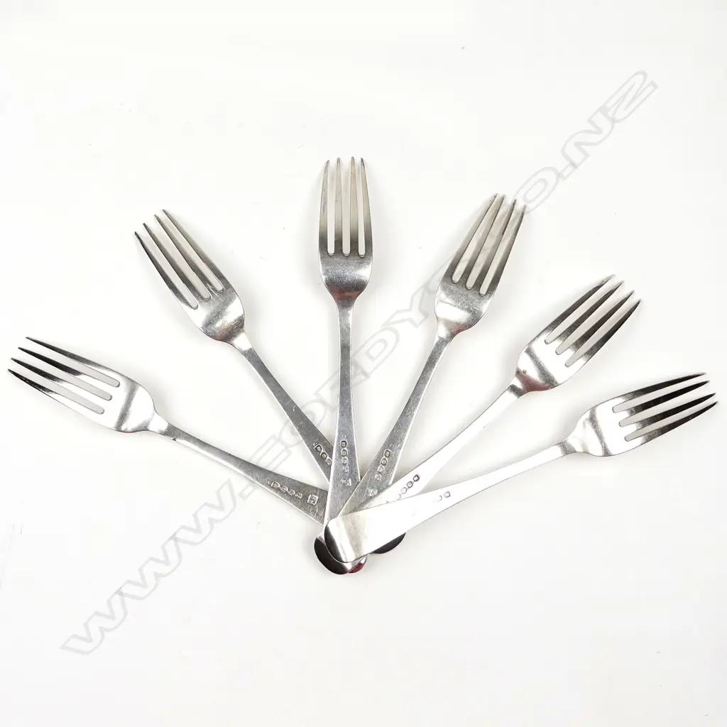 A set of six George III silver Hanoverian pattern table forks Image 1++