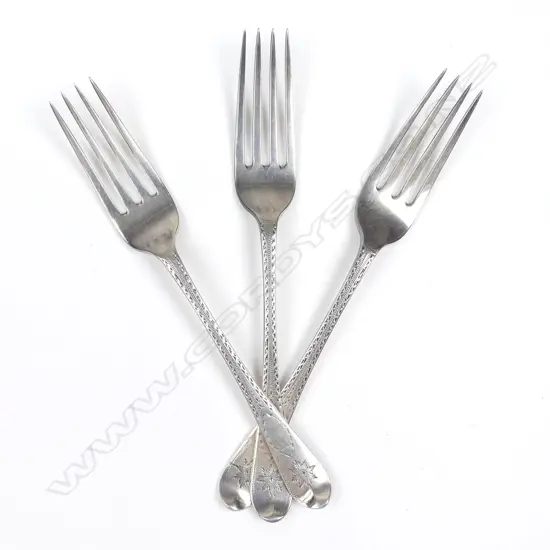 Three silver dessert forks