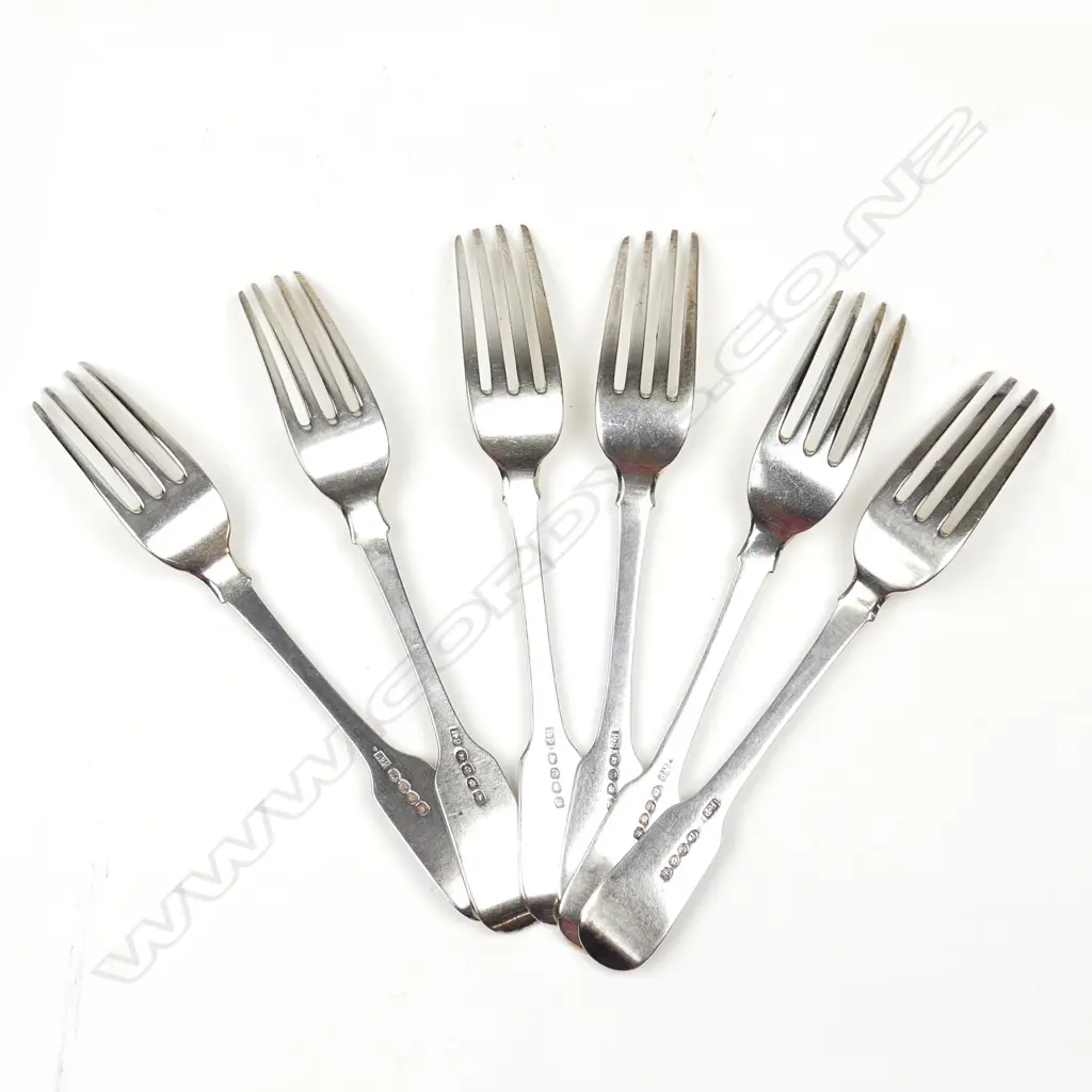 A set of six Georgian silver fiddle pattern table forks Image 1++