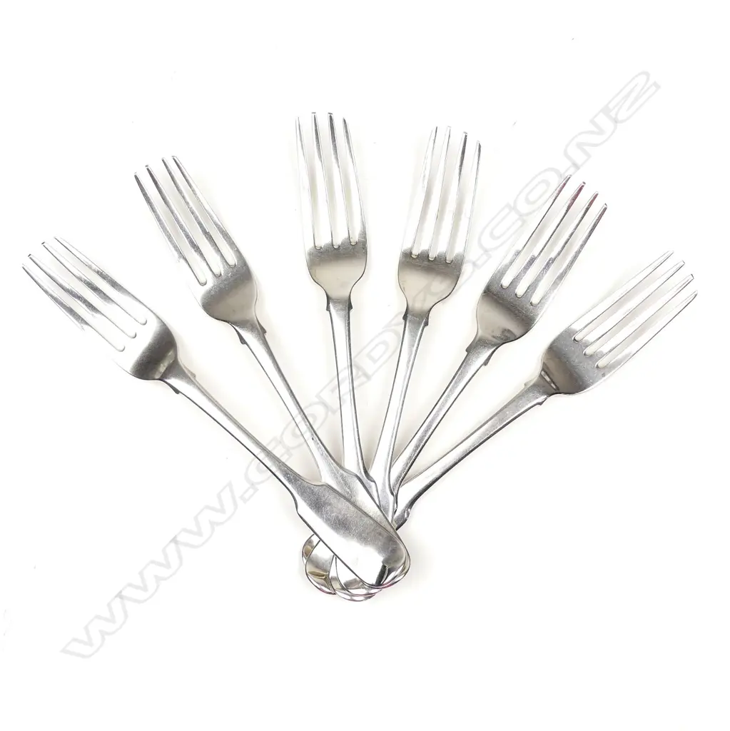 A set of six Georgian silver fiddle pattern table forks Image 1++