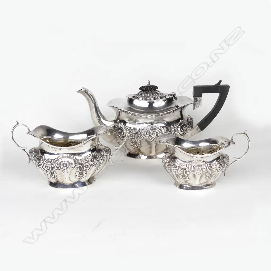 An Edwardian silver bachelor's three piece tea set Image 1++