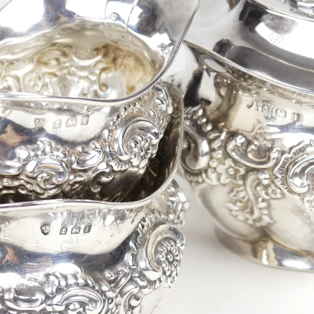 An Edwardian silver bachelor's three piece tea set Image 1++