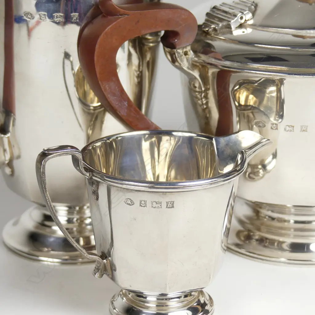 A three piece silver tea set Image 1++