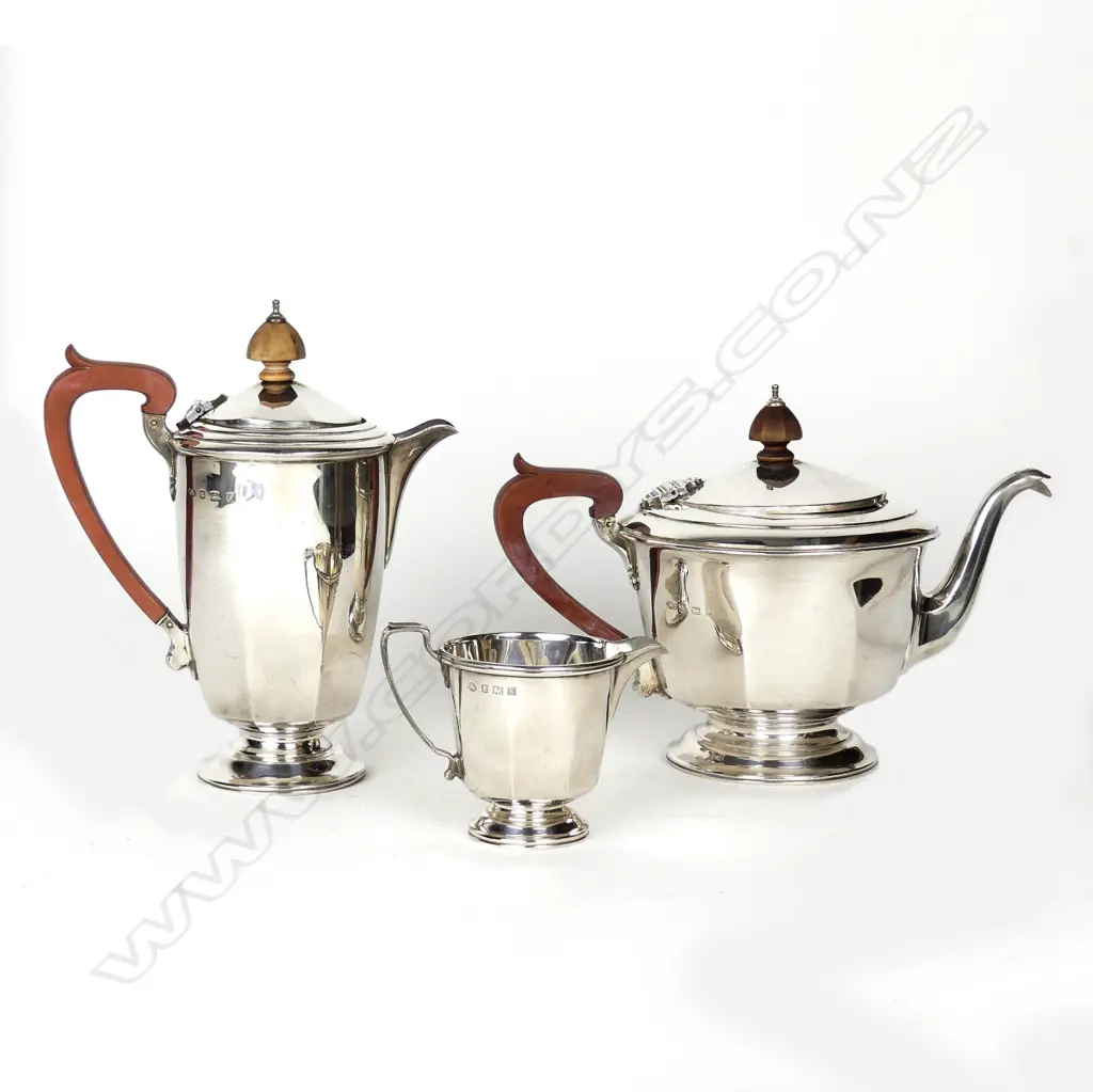 A three piece silver tea set Image 1++