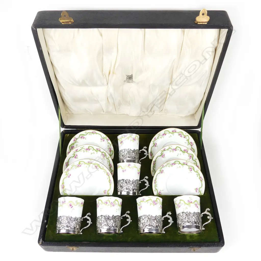 An early 20thC silver mounted Crown Staffordshire china demi-tasse coffee set Image 1++