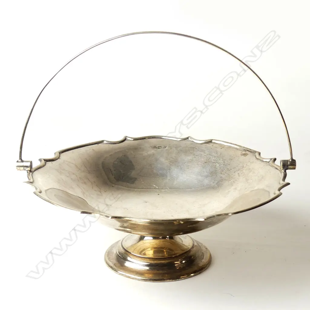 A 20thC silver swing handled basket Image 1++