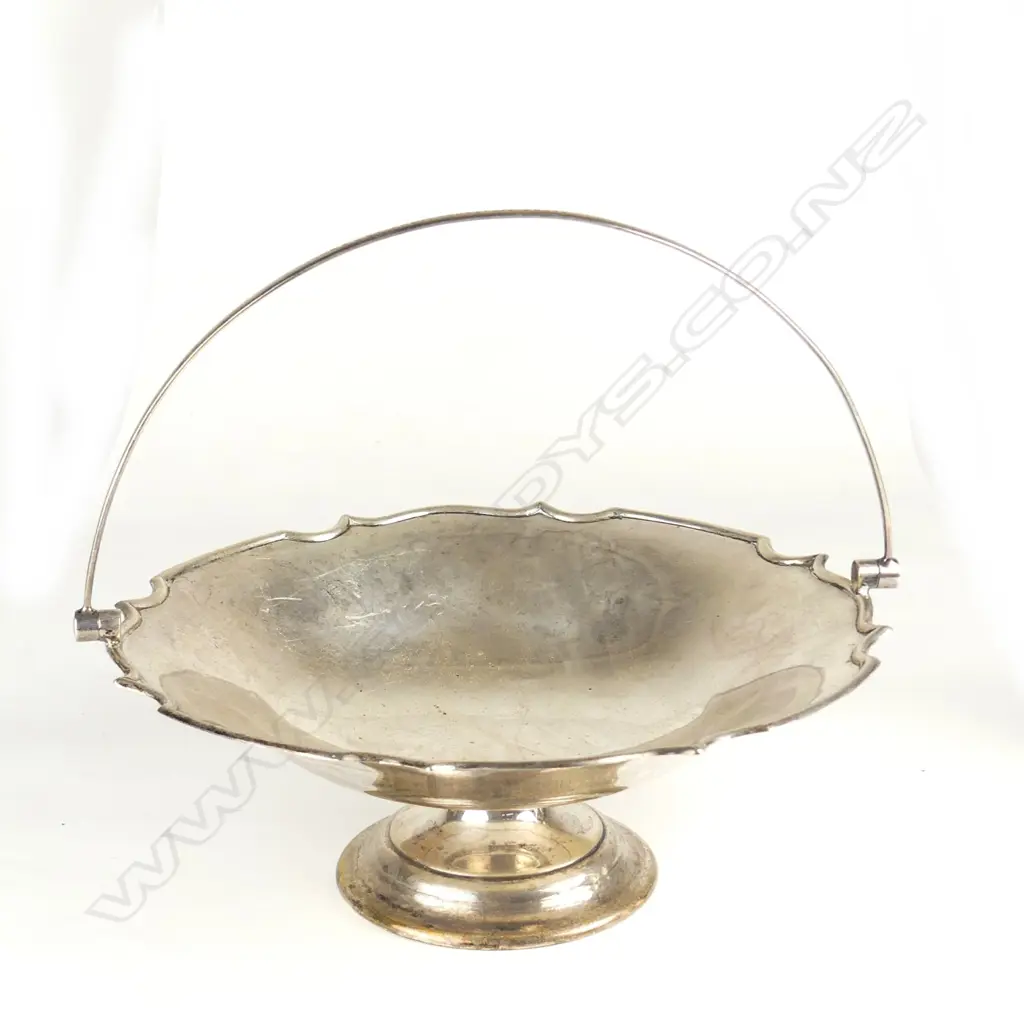 A 20thC silver swing handled basket Image 1++