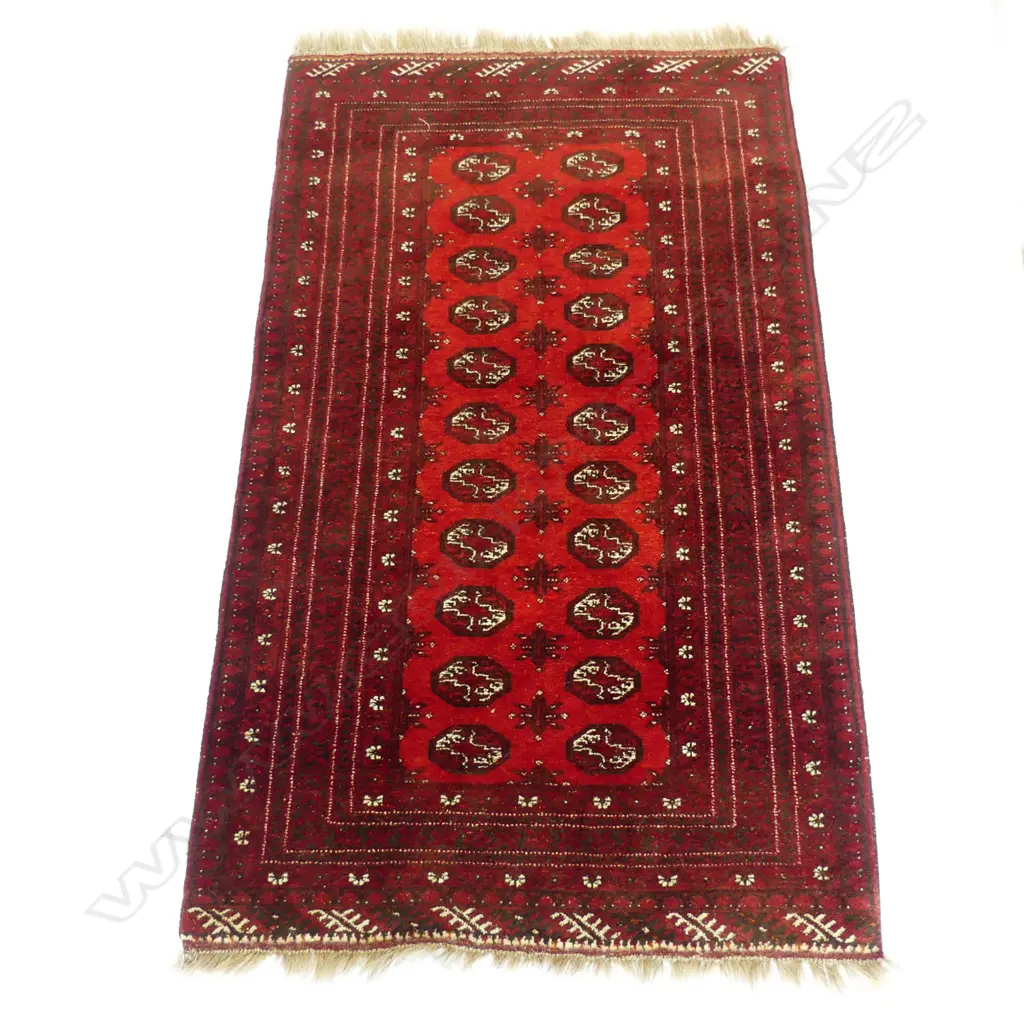 A hand knotted Bokhara rug Image 1++