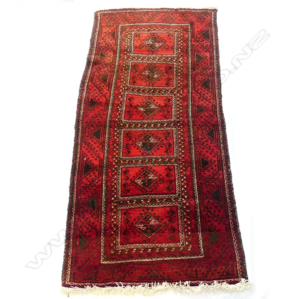 An Afghan Baluchi wool on cotton runner rug Image 1++