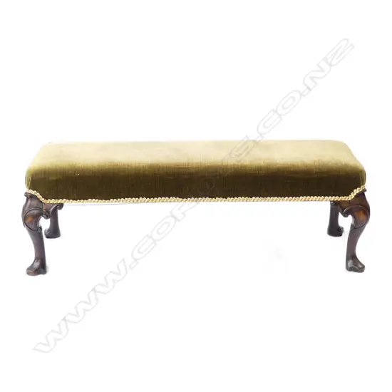 An early 1900s long foot stool