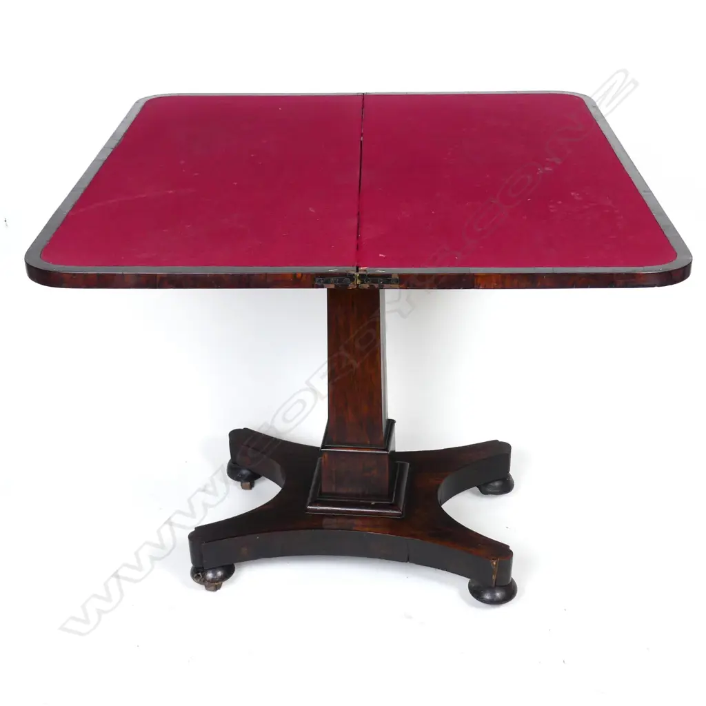 A Regency rosewood fold-over top games table Image 1++