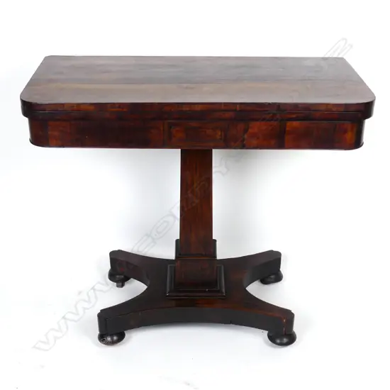 A Regency rosewood fold-over top games table